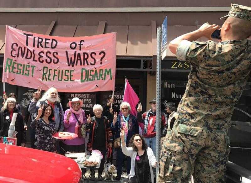 Activists in Berkley shut down a recruitment centre for CO day! Photo: Courage to Resist