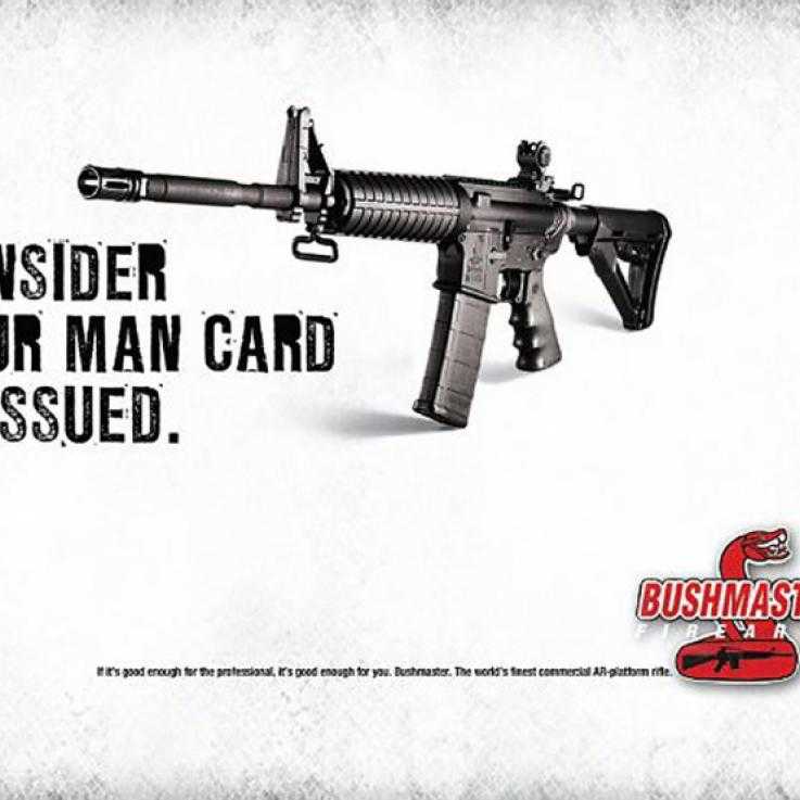 A gun advertisement, showing a picture of a large assault rifle with the words "consider your man card reissued".