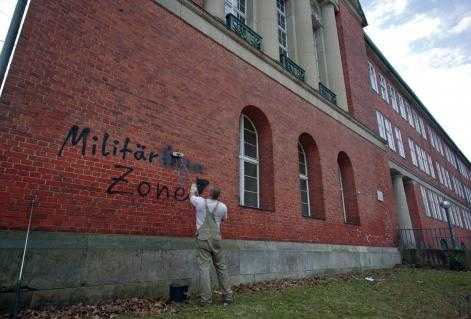 Graffiti on the wall of a school in Berlin reading 'Military-free zone&', March 2010 (credit - Michael Schulze von Glaßer)